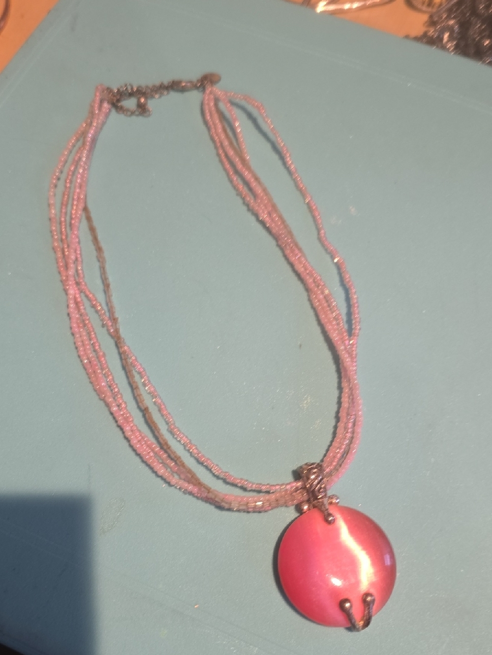 Pink Multi-Strand Bead Necklace with Glossy Pink Disc Pendant